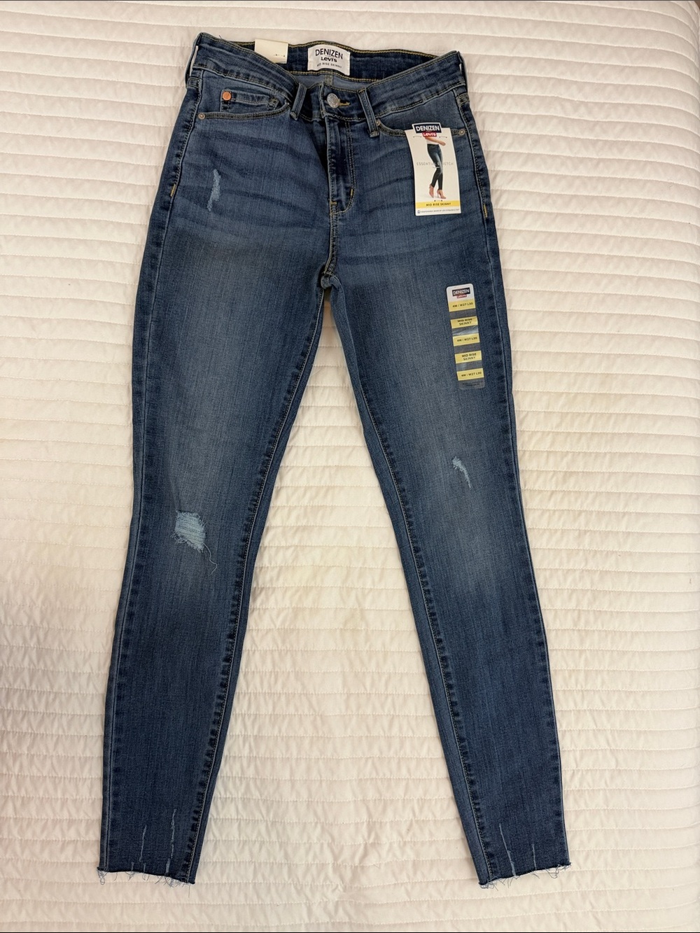 Denizen from Levi's Women's Medium Blue Distressed Mid Rise Skinny Jeans